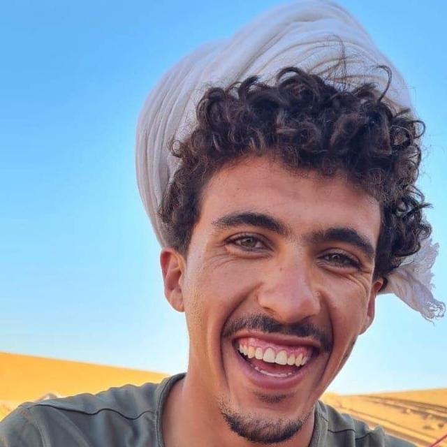 Group laugh together at Ait Benhaddou